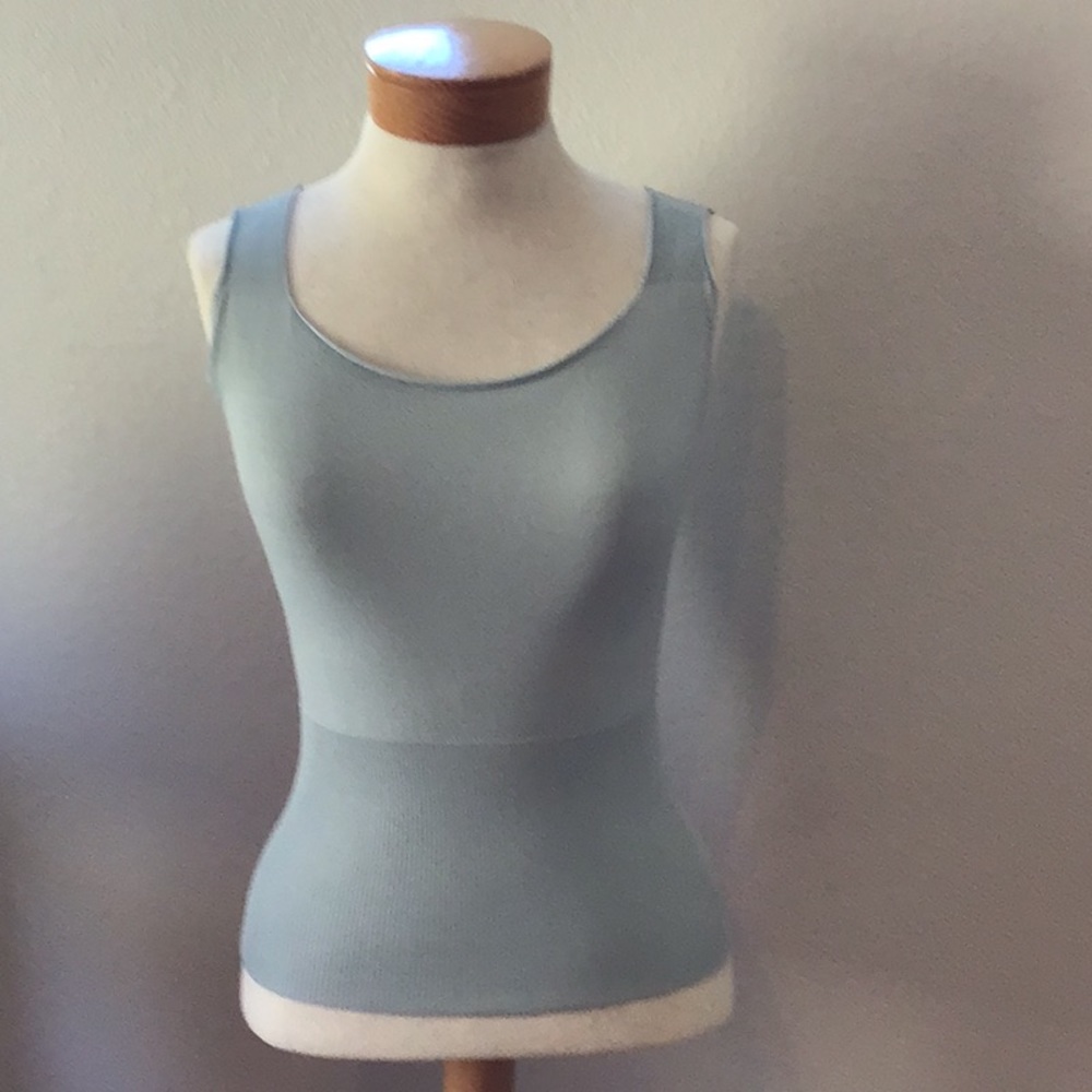 Max Studio form fitting blue sweater vest.